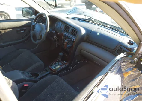 2001 Subaru Outback z USA, uszkodzony, nr VIN 4S3BH675617650157